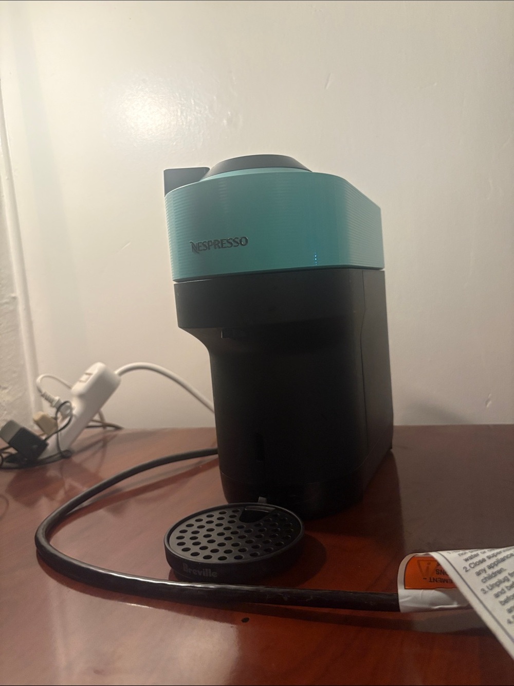 Nespresso Single-Serve Coffee Machine in Black and Teal